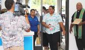 Huge smiles on the faces of Bluesky Communications employees as they were officially welcomed into their newly renovated store – which re-opened yesterday morning at the Laufou Shopping Center. [photo: TG]