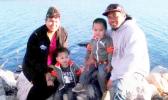 Aufanua Manusina, pictured here with his wife and two of his children, was deported to Samoa on Tuesday.  (Photo courtesy Sauelelee Manusina) 