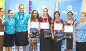 Four graduates were presented scholarships from Bluesky Communications yesterday at the company's main office at the Laufou Shopping Center. Three of the scholarships were for students accepted to off island schools and one for ASCC. The awardees are: Tedy Barber, Gabriella Langkilde, Farah Young, and Casidhe Mahuka.  [photo: Leua Aiono Frost]