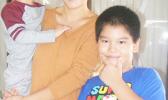 Susie Cheng and her two children, at the Pago Pago International Airport on Sunday morning, were among the first nine-passengers on Talofa Airways’ inaugural flight from American Samoa to Nuku’alofa, Tonga on Sunday, July 2.  [photo: FS]