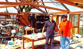 Paul Bayly (l) surveying the damage done by TC Winston with ​DS at RKS school library in Viti Levu, with one of his deputies Puamao Sowane (r).  [Courtesy photo]