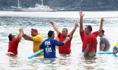 Swim Coach Zero Iaulualo praised athletes with special needs for finishing the swim meet and making it to the finish line. The first adaptive aquatic  swim meet was held last Saturday at Utulei Beach. [Photo: Ese Malala]