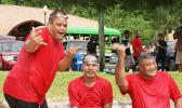 Three athletes with special needs excitedly pose for the camera after racing in one of the heats of the first adaptive aquatic Swim Meet in American Samoa held last Saturday in Utulei.  [Photo: Ese Malala]