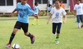 A Kanana Fou 2 player dribbles away from a Pacific Horizons opponent of the 2016 FFAS Private Elementary Schools soccer league’s Grades 3-5 Division on Match Day 2 at the Kanana Fou Seminary Field on Thursday, Oct. 20, 2016.   [FFAS MEDIA/Brian Vitolio]