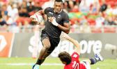 Fiji powers on 40-0 vs Hong Kong in the Singapore Sevens, Day 1, National Stadium, Singapore.   [Photo: Barry Markowitz]