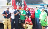 Fire Chief O'Brien and his crew, along with officials from the School Lunch Program, following a presentation by the Fire Dept. last Thursday during the week-long food safety training workshop for all SLP cooks and food handlers. See story for full details.   [Courtesy photo]