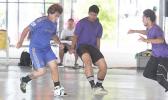 A Green Bay A player dribbles the ball as two PanSa opponents converge on him during Match Day 3 of the 2017 FFAS Futsal Tournament at Samoana High School’s gym in Utulei on Saturday, May 20, 2017.   [FFAS MEDIA/Brian Vitolio]