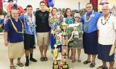 Fa’asao Marist High School 2017 Valedictorian, 17-year old Gabrielle Langkilde (4th from right) with her family, including her parents Victor and Gwen, following Saturday’s Fa’asao Marist HIgh School graduation ceremony at Fatu-o-aiga Hall. Gabrielle will be heading soon to Harvard University majoring in environment engineering. [Courtesy photo]
