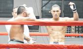 George Tanoa Jr. of American Samoa (right) raising his hand after winning his first professional fight — that was against veteran Tony Iapesa of Samoa in the heavyweight division during the American Samoa Flag Day 2017 Championship Boxing event for the All Samoan Light Heavyweight Title between the two Samoas last Saturday night at the old Bowling Alley in Tafuna [photo: AF]