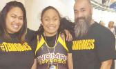 Goddess Ma’alona-Faletogo, a 14 –year-old Samoan girl — who was born blind — with her proud parents this past weekend at the Washington State Wrestling Championship in Washington, at the Tacoma Dome.  [Courtesy photo]