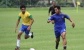 Green Bay’s Pamata Punefu, right, dribbles against Vaiala Tongan’s Mahonri Lotulelei in a men’s game on Match Day 5 of the 2016 FFAS National League on Saturday, Sept. 17, 2016 at Pago Park Soccer Stadium.  [FFAS MEDIA/Brian Vitolio] 