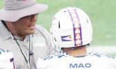 American Samoa All-Star Head Coach, Pati Pati – encouraging Adan Mao and our defensive unit during their match up against Hawaii West, their final game of the classic that was held last week at Aloha Stadium in Hawaii.  [photo: Dann Ebina]