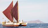 The Hawaiian voyaging canoe, Hōkūle'a, set out on a trip around the world in 2013 to promote traditional sailing techniques and marine conservation.  [Photo: 'Oiwi Tv / Kaipo Ki'aha]  Hokule'a, Hawaiian canoe, makes historic home return