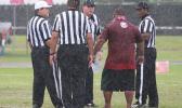 A frustrated Kolose Ili, the Warriors Head Coach arguing with the official on a call – Nu’uuli’s fourth down which resulted in a fumble, giving the Wildcats the fortunate first down conversion that allowed them the opening touchdown of the game, late in the first quarter of play. [photo: TG]