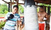 One of American Samoa’s rising stars Jeffrey Tago (left) during his training for the “2Samoa Battle” this weekend, with Petelo Matagi of Samoa (right) who is helping him out. [photo: AF]