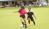A Tafuna Jets player receives a pass as a Black Roses opponent defends during a game of the women’s 2017 FFAS National League on Saturday, Sept. 23 at Pago Park Soccer Stadium.   [FFAS MEDIA/Brian Vitolio]