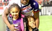USA Eagles 7s player, Kevon Williams, enjoys hosting his kids on the pitch at BC Place, after the Canada 7s, Vancouver, Canada.  [photo: Barry Markowitz