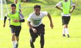 A Leone Lions’ striker races a Samoana defender one-on-one to score a goal during an ASHSAA Boys Soccer JV game on April 20, 2018 at Pago Park Soccer Stadium.  [FFAS MEDIA/Brian Vitolio]
