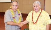 This photo by Apia-based journalist Joyetter Feagaimaali’i, provided to Samoa News for publication with permission, shows American Samoa Gov. Lolo Matalasi Moliga (left) shaking hands with Samoa Prime Minister Tuilaepa Sailele Malielegaoi, before the start of the Nov. 30th executive session of the Two Samoa Talks at the Tui Atua Tupua Tamasese Efi Convention Center in the heart of Apia.  [photo: Joyetter Feagaimaali’i]