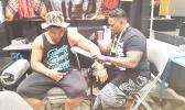 Although it was his first time attending at the Northwest Tatau Festival in Washington state, Tahitian tattoo artist Makalio - originally from Wallis and Futuna - took home top honors when his beautiful artwork won first place in the "Best Female - Large Polynesian Tattoo" category. Makalio, who speaks no English and had to communicate through a translator, is the owner of Tagaloa Tattoo Shop.  [photo: Blue Chen-Fruean]