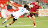 Defender Tila Mealoi and his Manu Samoa teamates played strong to the end in their Trophy Semi Final but bowed out to Wales 14-19.Singapore HSBC Sevens, Day 2, National Stadium, Singapore. [Photo: Barry Markowitz]