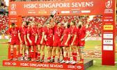 Canada 7s player, Mike Fuailefau proudly raises the HSBC Singapore 7s Cup after his team defeated the USA Eagles 6-19 at the Singapore HSBC Sevens, Day 2, National Stadium, Singapore.  [Photo: Barry Markowitz]