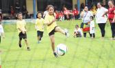 A player of the Pago Youth mixed 7-9 age group shoots and scores a goal on July 4, 2017 during opening day of the FFAS Summer Youth League at Pago Park Soccer Stadium.  [FFAS MEDIA/Brian Vitolio]