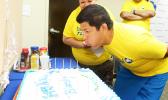 Former Bluesky Communications CEO and President, Adolfo Montenegro in a Samoa News file photo blowing out the candles on the Bluesky birthday cake, in celebration of their company’s 16 years of service to the people of American Samoa, in July 2015. [photo: SN file / TG]