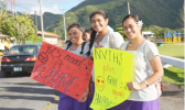 These are three students from Nu’uuli Vocational Technical High School (NVTHS) who exercised their right to freedom of speech last Friday, by participating in a wave —calling attention to the school’s key need, a gym. [courtesy photo]