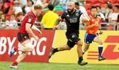 Captain DJ Forbes advances the ball in the All Blacks' 36-14 victory over Wales at the Singapore Sevens, Day 1, National Stadium, Singapore. [Photo: Barry Markowitz]