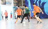 Ne’emia Kaleopa of Utulei Youth (middle) controls the ball against Royal Puma’s Willie Malele (right) and TJ Tauamo (left) during their 2017 Futsal Tournament’s pool game at Samoana High School’s gymnasium on Saturday, May 6, 2017.  [FFAS MEDIA/Brian Vitolio]