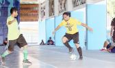 Rambo Tapui (right) of Pago Youth 1 in action against a Lion Heart A opponent during their 2017 Futsal Tournament’s pool game at Samoana High School’s gymnasium on Saturday, May 6, 2017.  [FFAS MEDIA/Brian Vitolio]