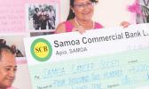 Samoa Housing Corporation Chief Executive Mata’utia Rula Levi presenting their donation to the Samoa Cancer Society to assist with the early detection to cure cancer public awareness campaign.  [Courtesy photo]