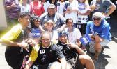 Managing Director Howard Afualo of Pacific Tires & Auto Parts with co-sponsor 93KHJ and the American Samoa Handball Team U17 Boys & Girls last Saturday at the one year anniversary celebration for Pacific Tires in Tafuna. [Photo: Ese Malala]