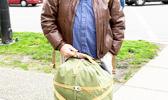 Pacsafe products are lightweight, covertly secure, and mine shown in Vancouver, Canada is even a roller duffle  [Photo by Allan Hamilton]
