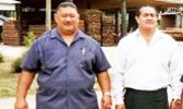 ASPA’s Managing Director Paul Young (right) pictured during a recent trip to Tonga to procure electricity poles manufactured by the Tonga Forestry and Milling Company. [photo: provided by DOC]