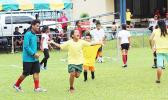  A Pago Youth player of the 7-9 mixed age group celebrates after his team scores a goal on July 4, 2017 during opening day of the FFAS Summer Youth League at Pago Park Soccer Stadium.  [FFAS MEDIA/Brian Vitolio]