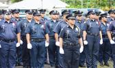 Police officers stand at attention, at the start of the official opening yesterday morning at the Fagatogo malae — Malae o le Talu — of Police Week in American Samoa. Last week US President Donald J. Trump issued a proclamation which proclaims May 15th as Peace Officers Day, honoring those who died in the line of duty last year. [photo: AF]