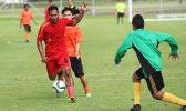  Iosia Tasi of Black Roses defends against a Royal Puma attacker to give his goalie time to collect the ball during a men’s game on Match Day 4 of the 2016 FFAS National League on Saturday, Sept. 10, at Pago Park Soccer Stadium.   [FFAS MEDIA/Brian Vitolio]