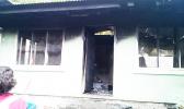 What remains of a home in Fagasa destroyed by fire on Aug. 30th. Local authorities continue their investigation into the cause of the fire.  [photo: local Red Cross]