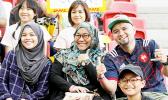 Rugby and its fans share a positive infinite diversity. Singapore Sevens, Day 1, National Stadium, Singapore. [Photo: Barry Markowitz]