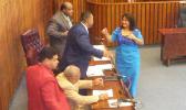 Education Department director-appointee Dr. Ruth Matagi-Tofiga (left) shaking hands and speaking with lawmakers after her confirmation hearing yesterday morning before the House Education Committee. She was later confirmed and now goes through Senate confirmation next week Monday.  [photo: FS]