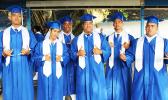 Proud Samoana graduates pose for  the Samoa News camera before heading into their graduation ceremony to receive their high school diplomas. Congratulations graduates! [Photo:EM]