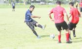 SPA’s Harvey Manu takes a shot at goal while two Faga’itua defenders attempt to block his shot during an ASHSAA Boys soccer game on Saturday, March 25, 2017 at Pago Park Soccer Stadium.  [FFAS MEDIA/Brian Vitolio]