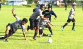 South Pacific Academy defenders scramble to clear a ball away from a dangerous opportunity to their Iakina opponents during an ASHSAA Boys’ varsity soccer game on Wednesday, March 28, 2018 at Pago Park Soccer Stadium.  [FFAS MEDIA/Brian Vitolio]