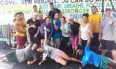 Locals and visitors at the South Pacific Watersports & Fitness after the 6am workout posing for a quick picture and getting ready to do the 7am workout. [Photo: Ese Malala]