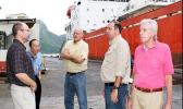 In this Nov. 2010 Samoa News file photo, Tri Marine Managing Director, Joe Hanby, Luen Thai President & COO, Sam H.T. Chou, STP Chief Executive, Ian Boatwood, STP Facility Manager, Craig Double, and Luen Thai Special Projects Executive, Joe Murphy, discuss the rehabilitation of the old SamPac Chicken of the Sea Cannery now Samoa Tuna Processors, on the busy STP dock. Now STP will close indecently in Dec.  Read  story on left. [Photo: Barry Markowitz]  