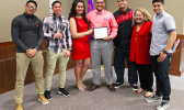 Family and Friends of Ricardo Gonzales (left to right) Tanielu Matautia, Salvation Lee, Caroline EJT Schuster, Justin Asaeli, Omeka Siataga, Loha Schuster, with , Ricardo Gonzales (center), after he received the Top Scholar Award in Criminal Justice from Missouri Valley College, last week. [courtesy photo]