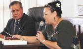 Senate President ProTem, Nuanuaolefeagaiga Saoluaga Nua (left) lookong on, as Senate legal counsel Mitzie Jessop-Ta’ase reads for senators, local law which requires Fono approval of money in the law enforcement fund to finance purchases of new police vehicles. [photo: FS]