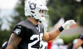 The Raiders safety Shalom Luani (26) stretched before drills. The 2017 Oakland Raiders practiced at their Napa, Calif. facility Saturday August 5th in front of several hundred adoring fans.[photo: Brant Ward] 